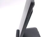 a close up of a cell phone on a stand
