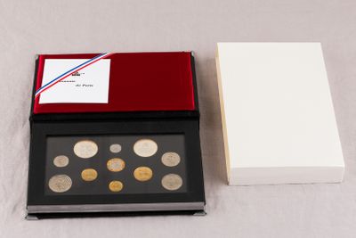 an image of a box with some coins inside of it