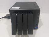 an image of a four - bay hard drive attached to a hard drive