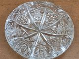a glass plate that has a star design on it
