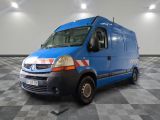 a picture of a blue van parked in a garage
