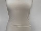 the top of a mannequin with a white shirt on a mannequin stand