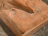 a statue of a horse that is sitting on a table