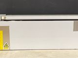 an image of a white machine sitting on top of a table