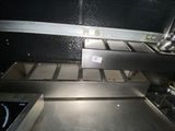 an image of a commercial kitchen with a lot of counter space