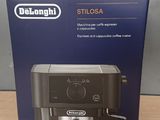 the box of the coffee maker is sitting on the table
