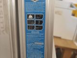 an image of a close up of a refrigerator door with a sticker on it