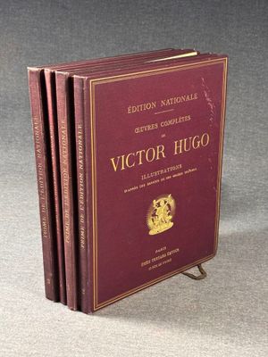 three books are stacked on top of each other on a table