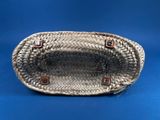 a close up of a woven basket on a blue background