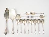 a lot of spoons and spoon spoons on the table