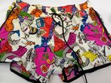a picture of a pair of shorts that are on a bed
