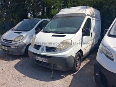 three white vans parked next to each other in a parking lot