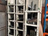 a room with a lot of shelves and crates in it