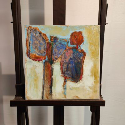a painting of a man holding a mirror on a easel
