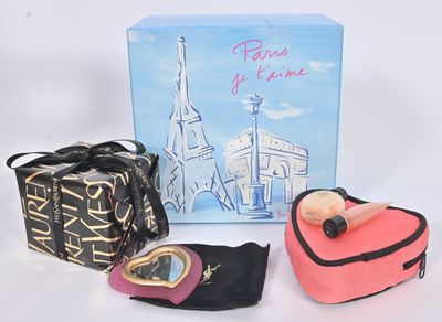 a box that has a pair of shoes and a bag in it