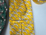 yellow and white neck tie and a green and white bag