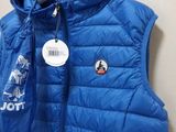 the vest is blue and has a white tag on it