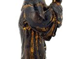 an image of a statue of a man holding a baby