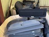 many pieces of luggage that are sitting in a box