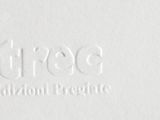 white business card with the name of a medical practice on it