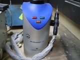 a vacuum that is sitting on the floor in the room