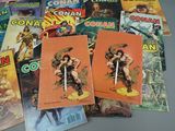 a lot of comic books that are on the table