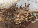 a small model of a ship on display on a table