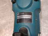 an image of a close up of a drill on a table