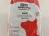 un sac de croquettes pour chiens adultes, posé sur une table