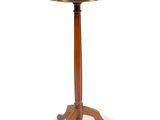 an image of a table with a glass top on a wooden stand