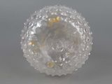 a close up of a glass ball on a table