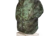 sculpture of a bear head on a marble base