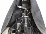 a bag with a bike inside of it on a white background