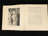 an open book with a picture of a man and a woman