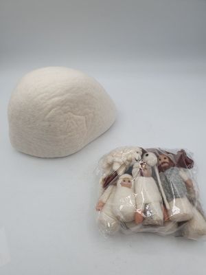 a ball of wool next to a bag of stuffed animals