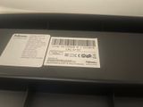 a close up of a printer with a barcode on it