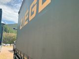 a large truck that is parked on the side of the road