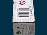 a box with a barcode on it sitting on a blue surface