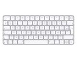 une photo d'un clavier d'ordinateur blanc sur fond blanc
