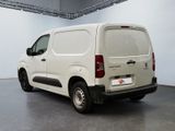 a white van that is parked in a garage