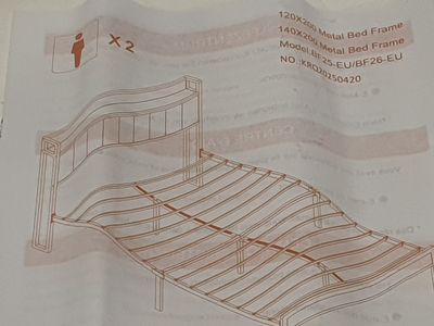 a drawing of a bed frame on a piece of paper