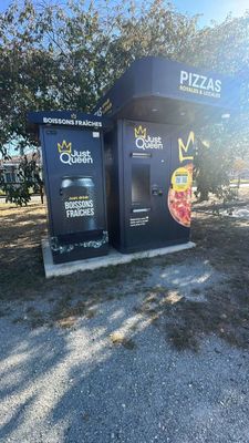 two vending machines that are on the side of the road