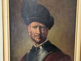 portrait of a man in a turban with a feathered hat