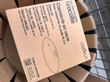 a box that is sitting on top of a basket