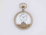 a gold pocket watch with a white face on it