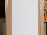 a picture frame sitting on top of a red box