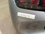 a close up of a car with a sticker on the back of it