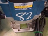 a picture of a router that has a cord attached to it