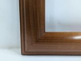 an image of a wooden frame with a white background