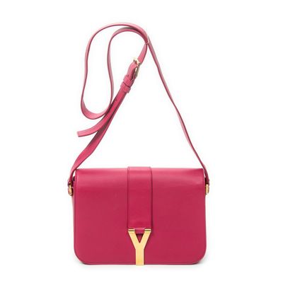 a pink y bag with a gold y logo on the front